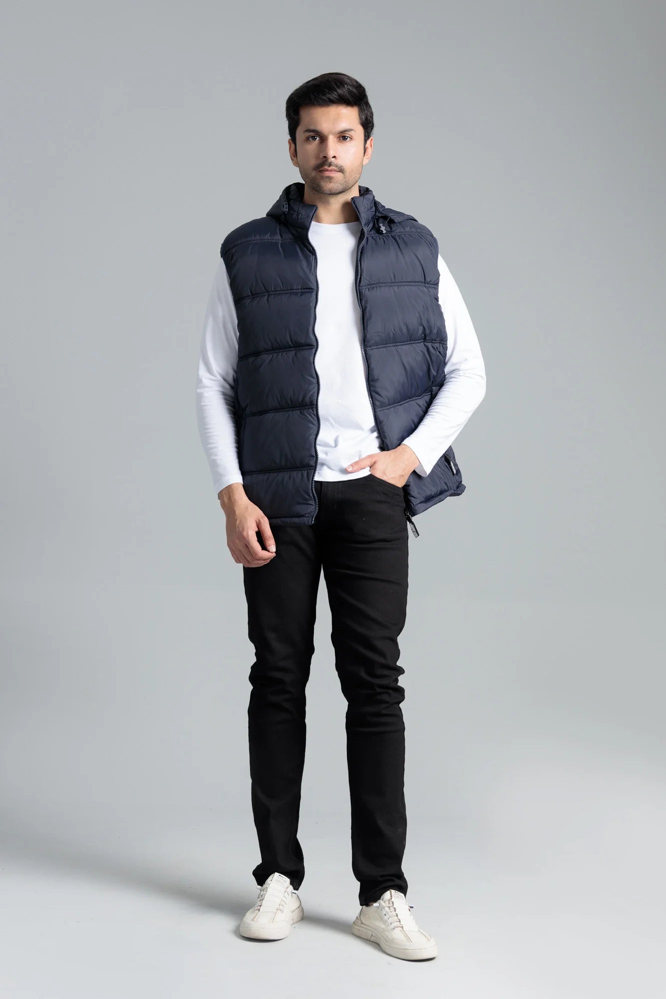 Grab Men’s Navy Sleeveless Parachute Jacket, Worn with White Shirt and Black Jeans