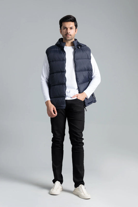 Grab Men’s Navy Sleeveless Parachute Jacket, Worn with White Shirt and Black Jeans