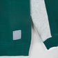 Green and gray sweatshirt with a brand logo on a white background