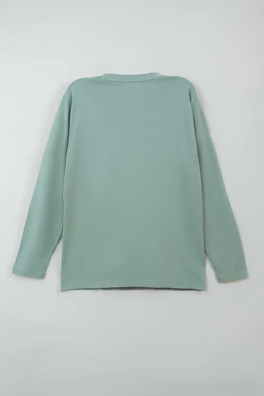 Green long-sleeve shirt