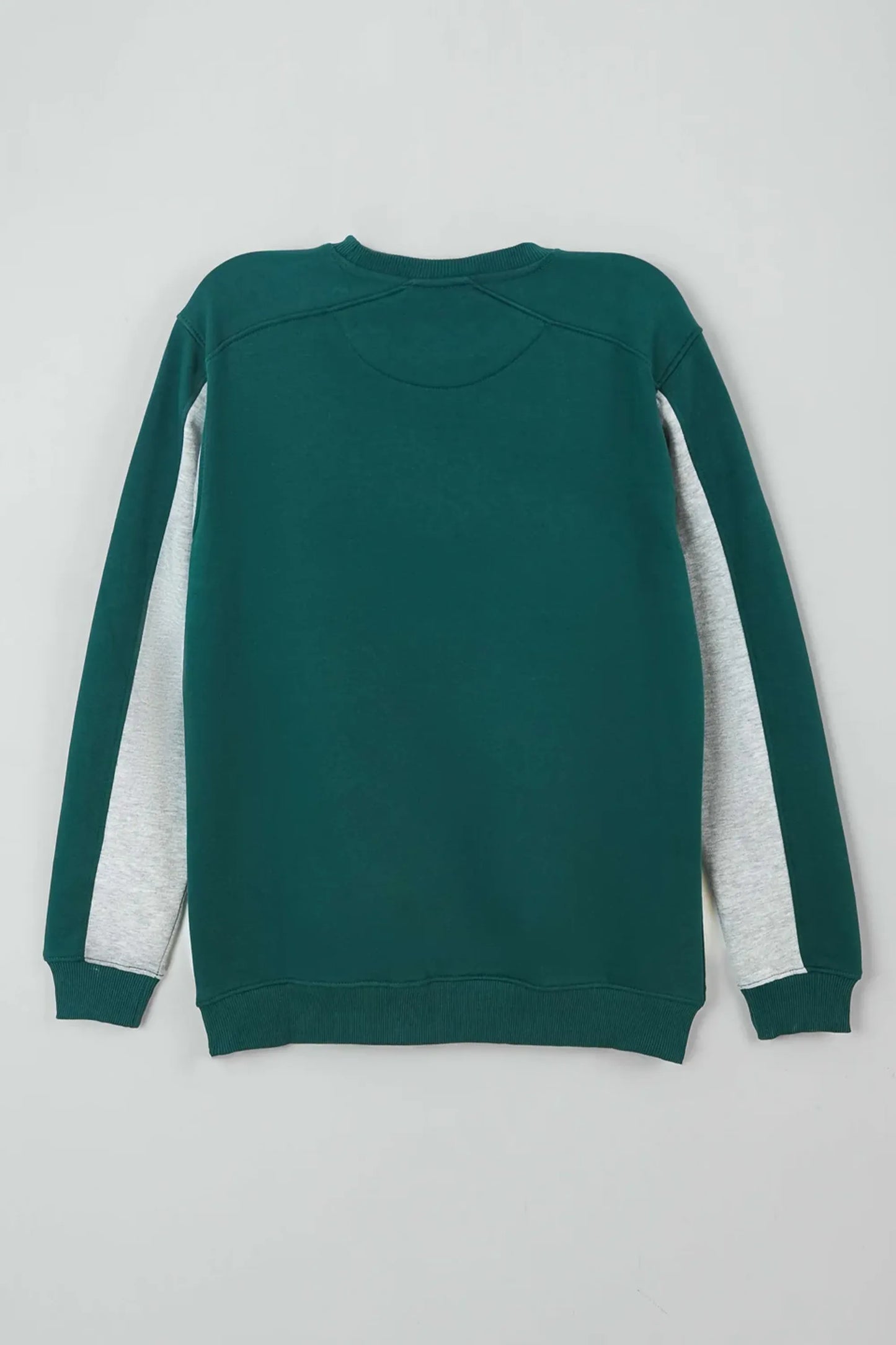 Green sweatshirt with white sleeves on a light gray background