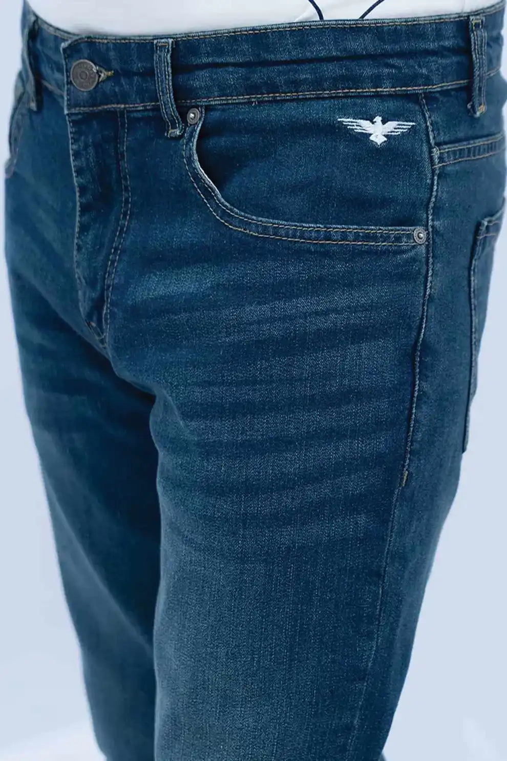 Green tinted slim carrot jeans