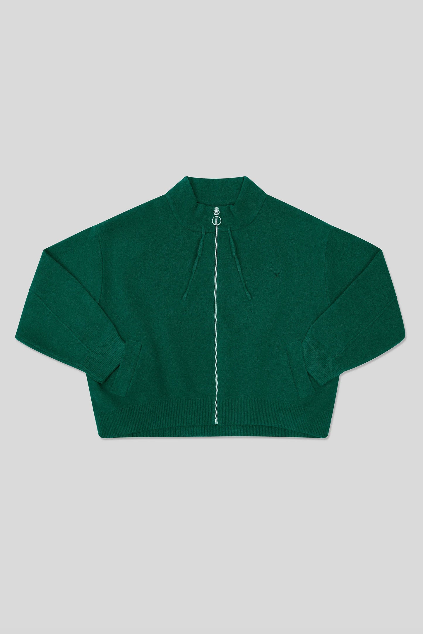 Green wool cardigan with front zipper and short structured silhouette
