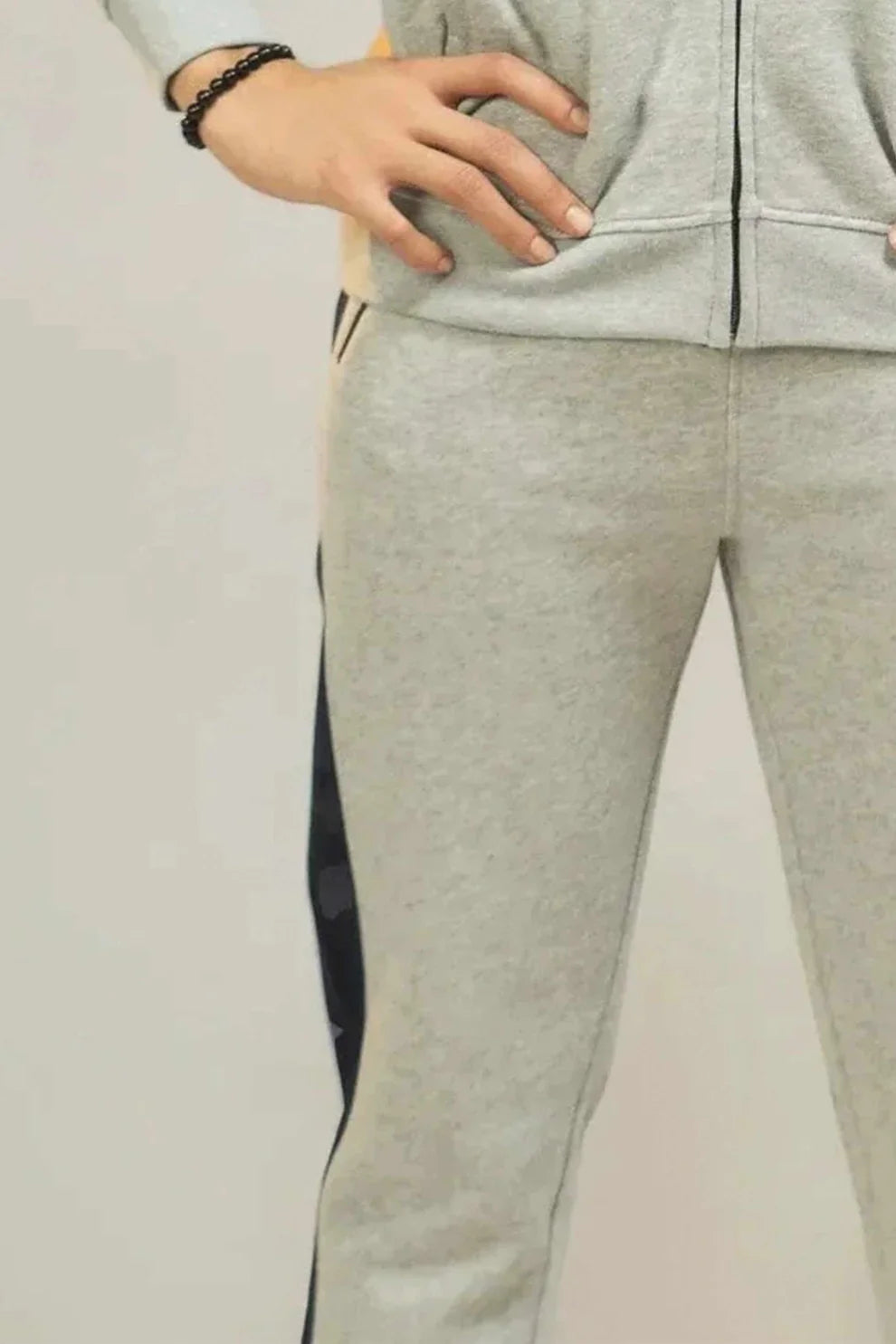 Grey fleece trousers close up