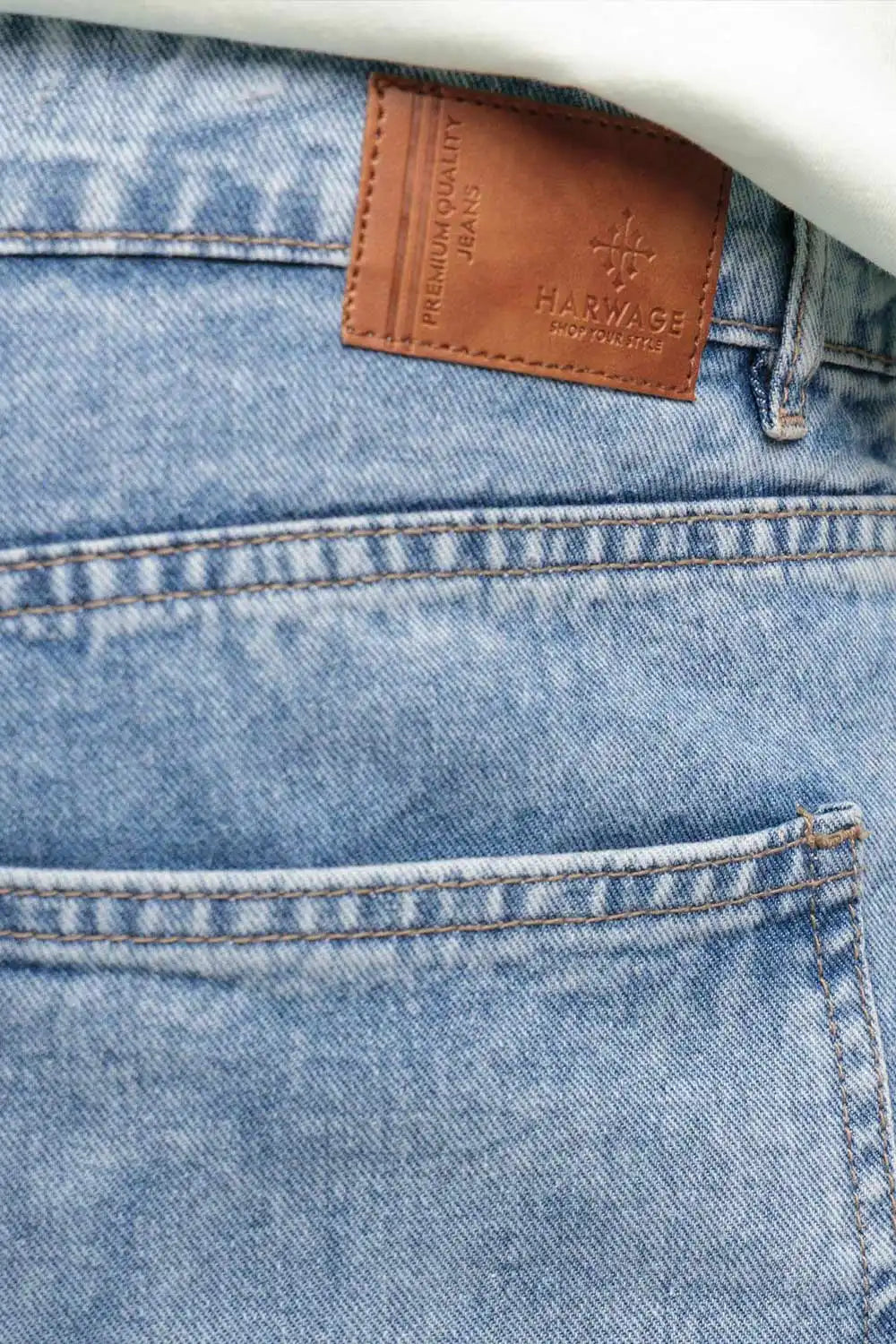 Harwage label on a blue denim jeans
