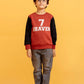 Little boy wearing a Sweatshirt in Orange Rust with jeans