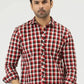 Man wearing a red and black checkered shirt