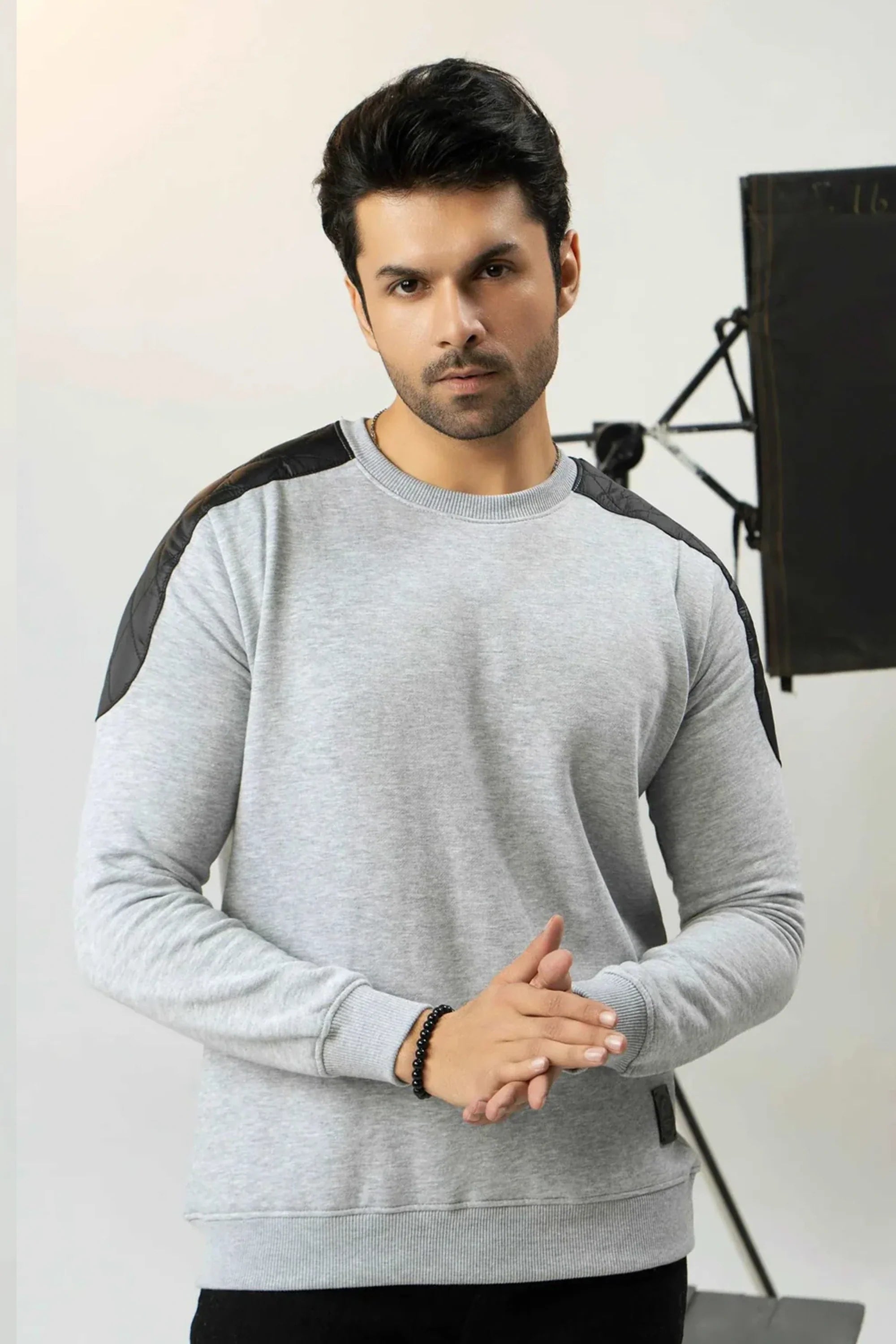 Men’s gray sweatshirt with black shoulder panels