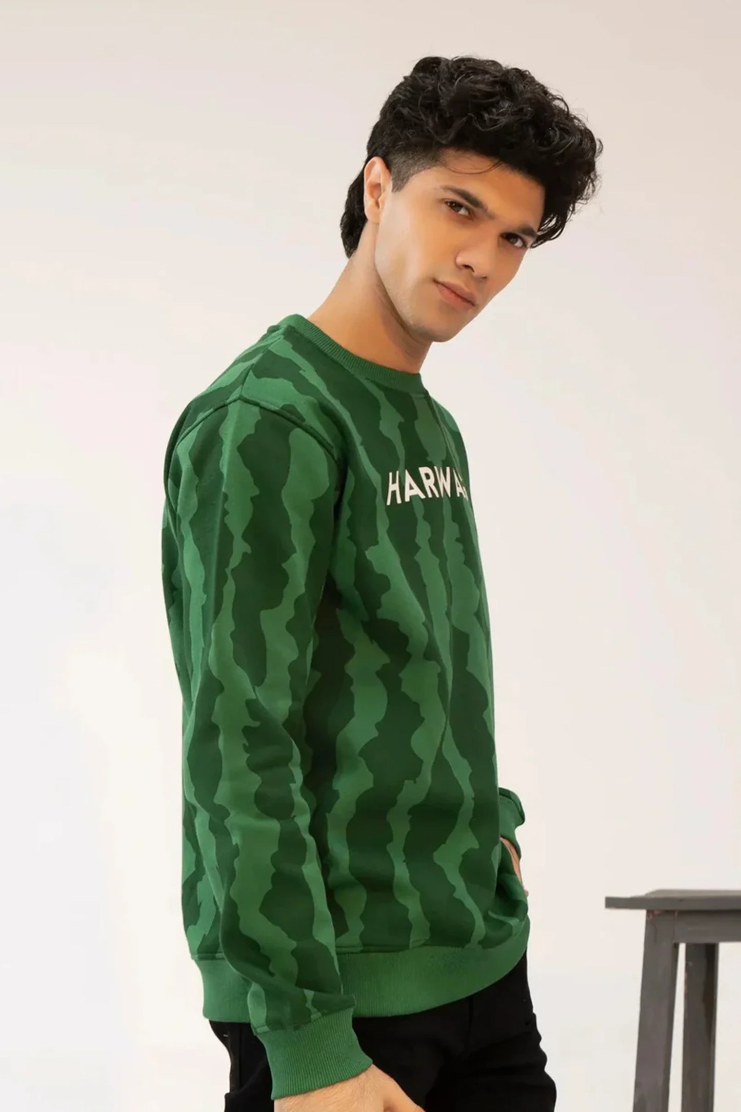 Men Green Camouflage Sweatshirt displayed in side pose for casual wear