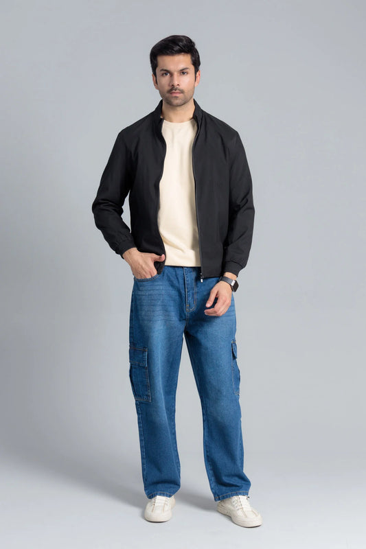 Men’s Black Wind Breaker Jacket paired with a beige t-shirt, blue jeans, and white sneakers