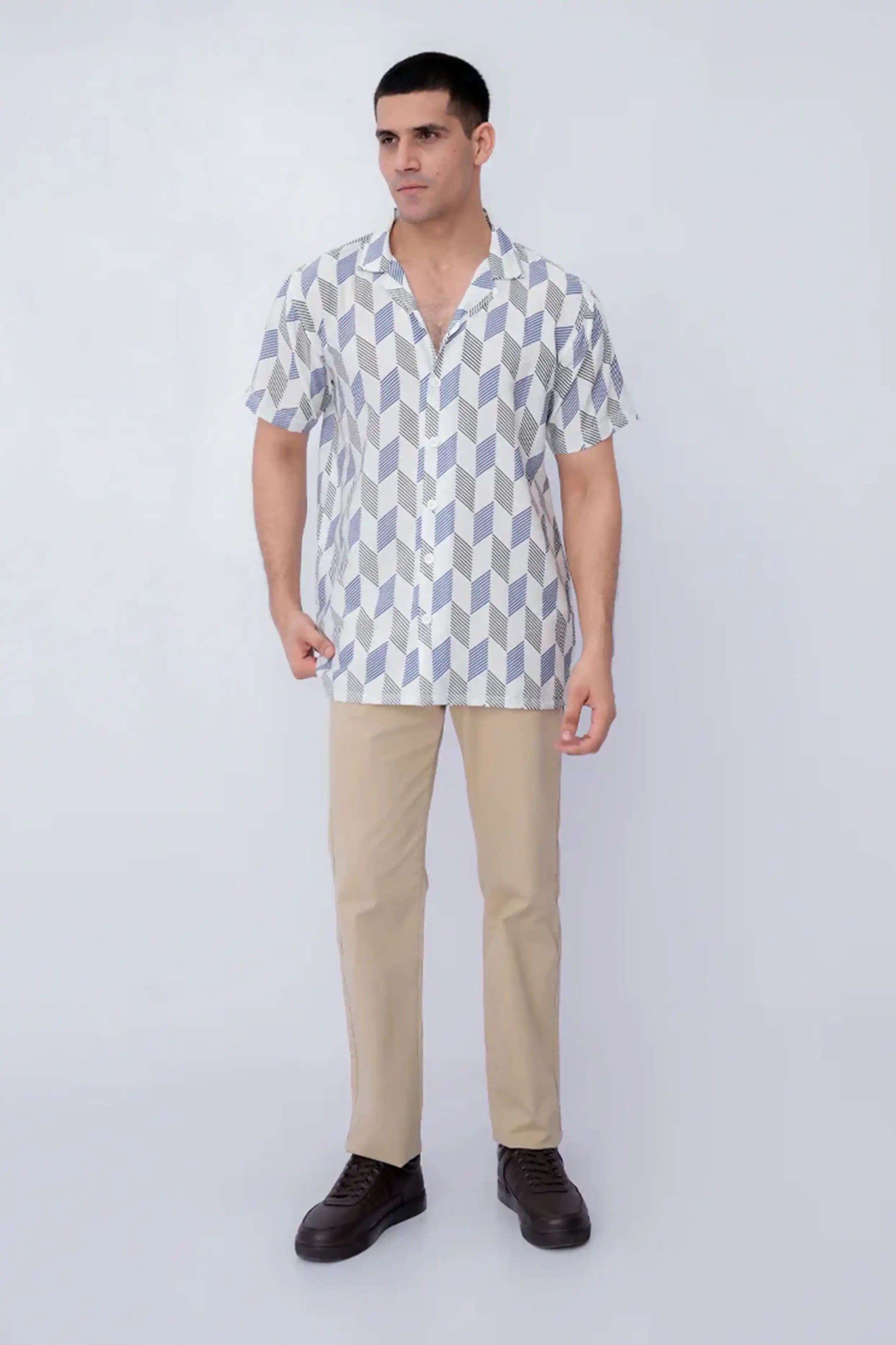 Men wearing a white casual shirt with beige pants