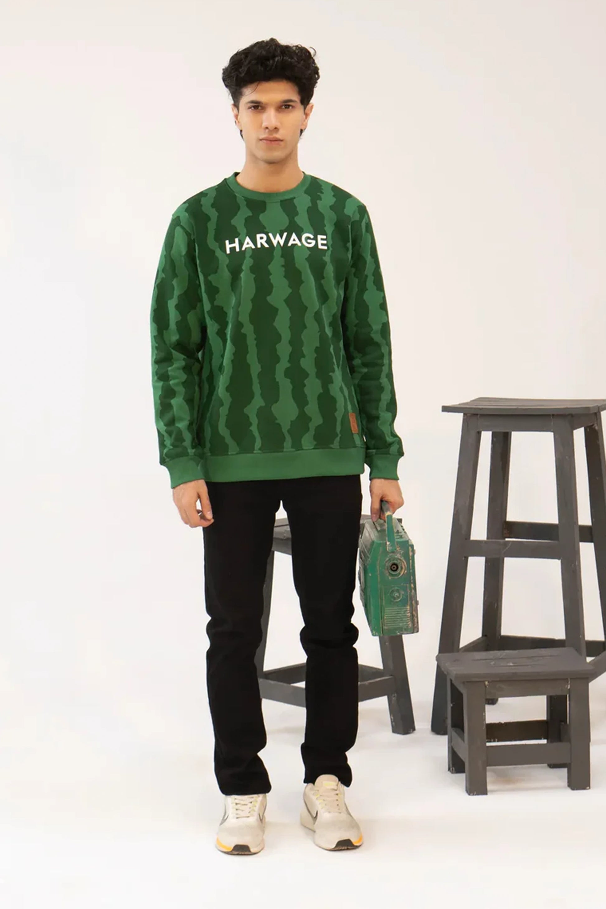 Men wearing green camouflage sweatshirt front view