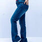 Mid blue jeans side view