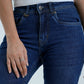 Mid blue straight fit jeans close up