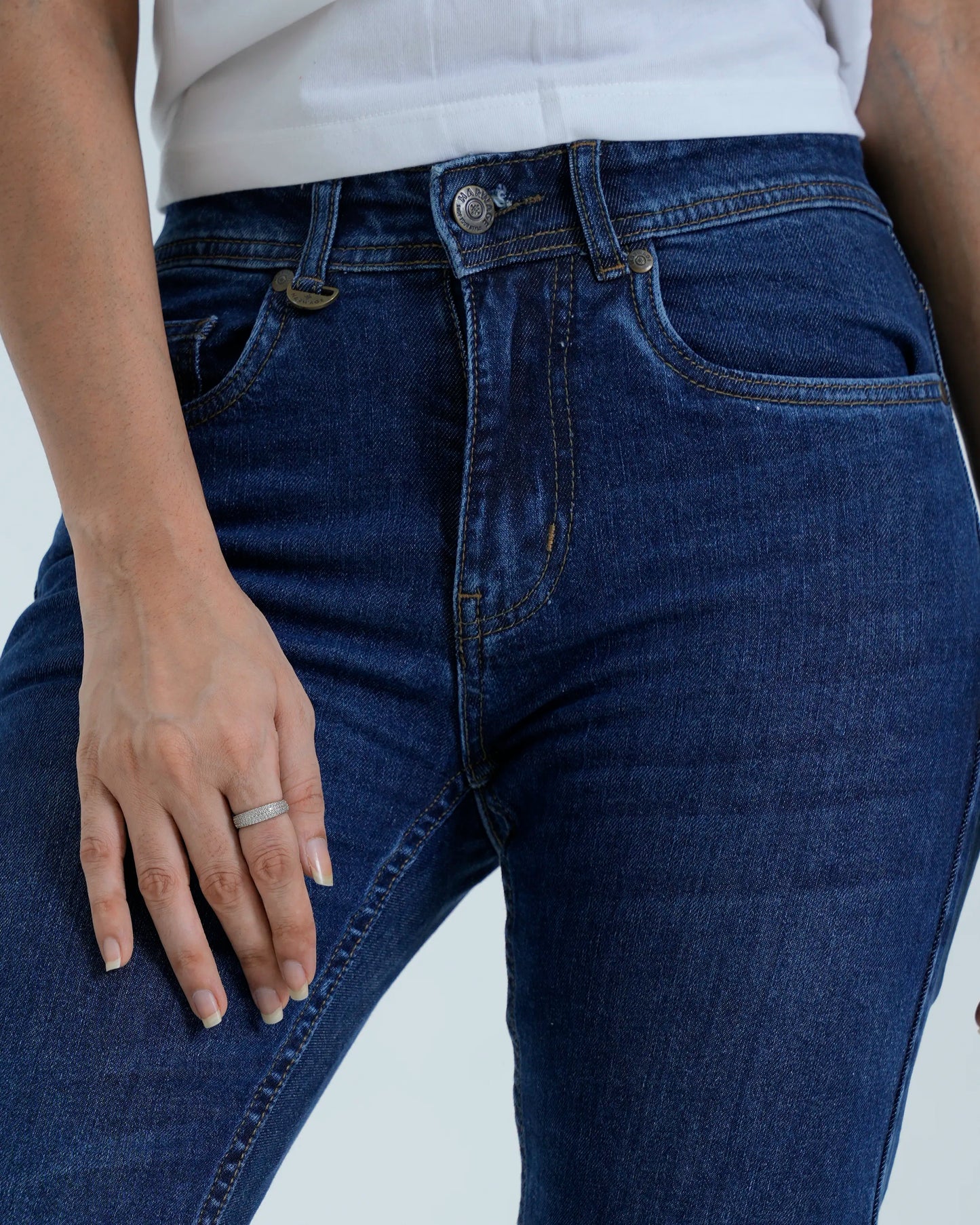 Mid blue straight fit jeans close up