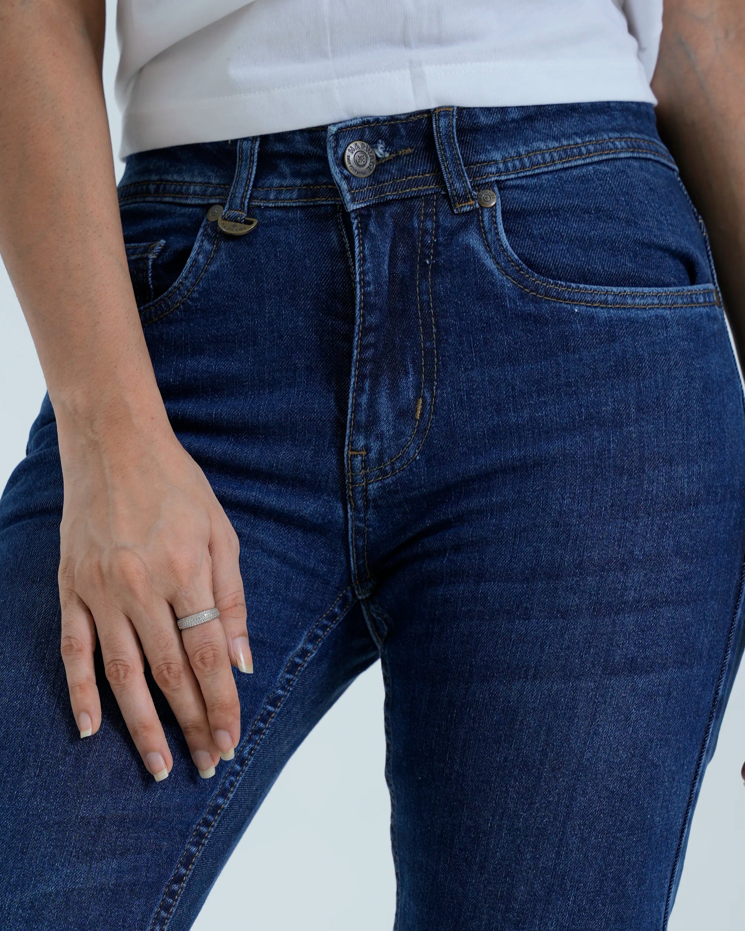 Mid blue straight fit jeans close up