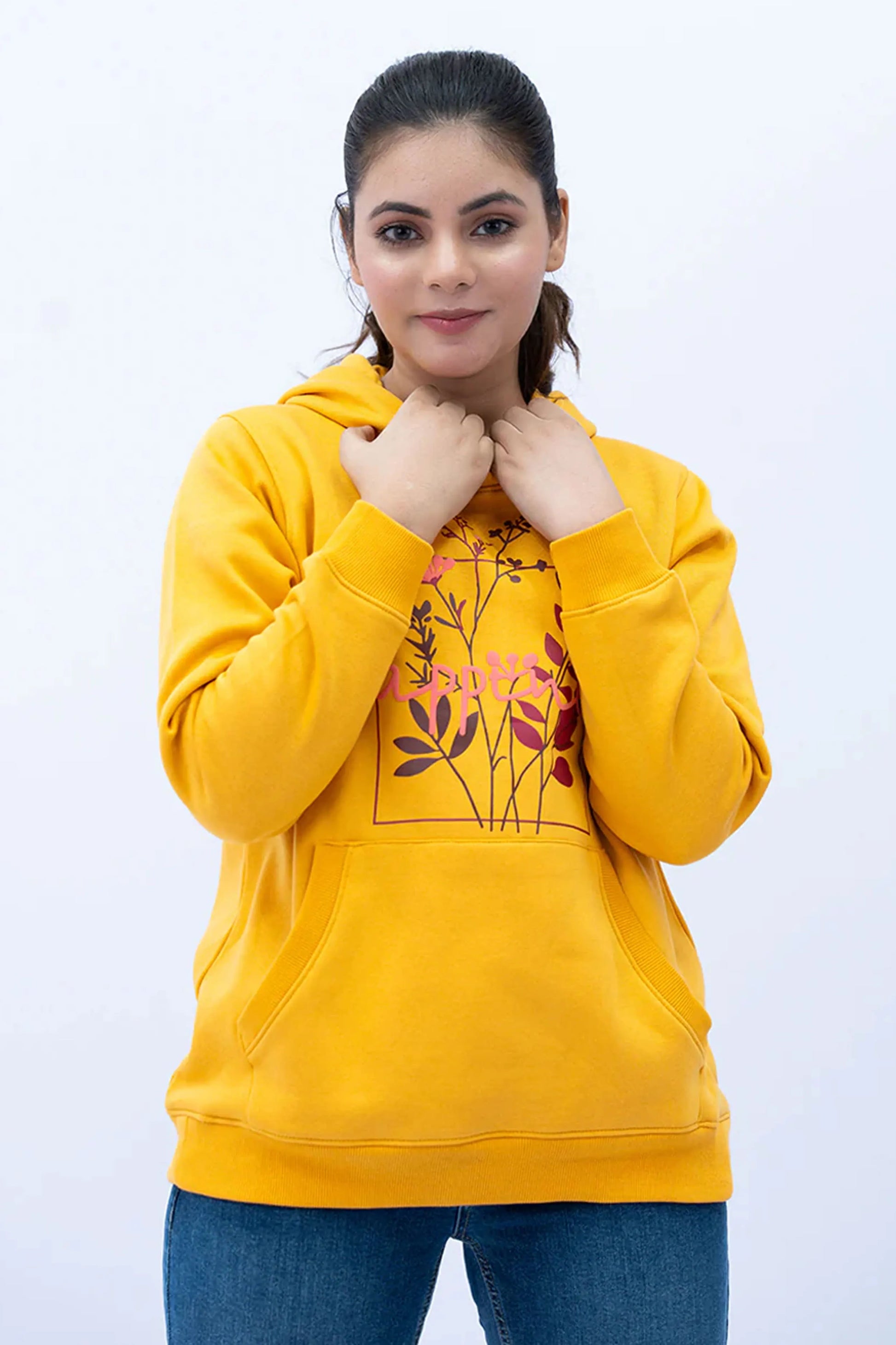 Model styled in a Mustard SLV Panel Hoodie designed for casual wear