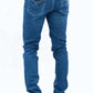 Person wearing blue jeans on a white background