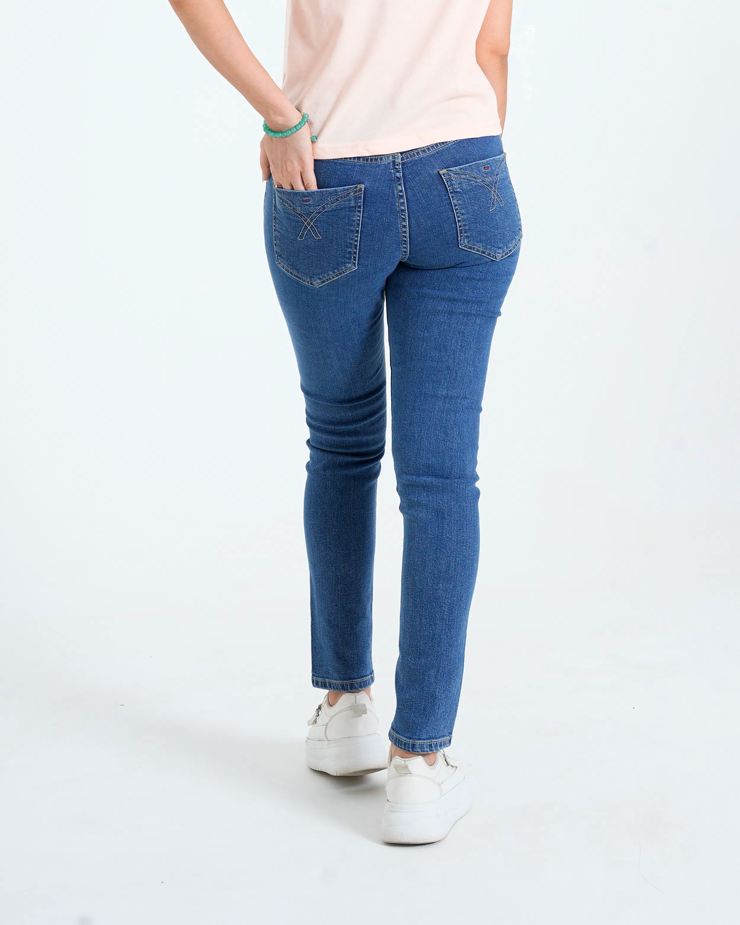 Navy blue slim denim back view