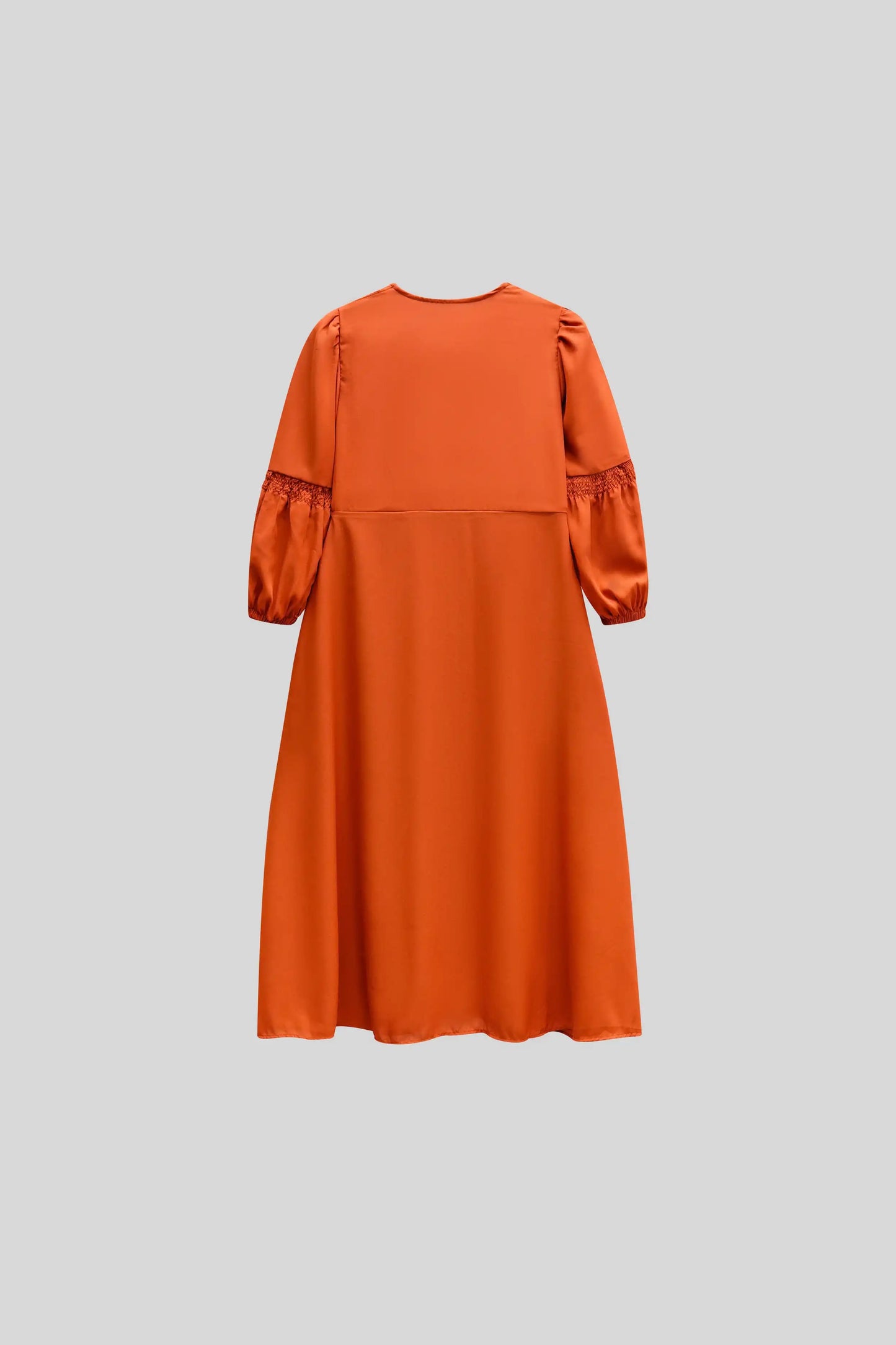 Orange dress with puff sleeves