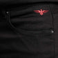 Black pants with a red embroidered eagle design on the pocket
