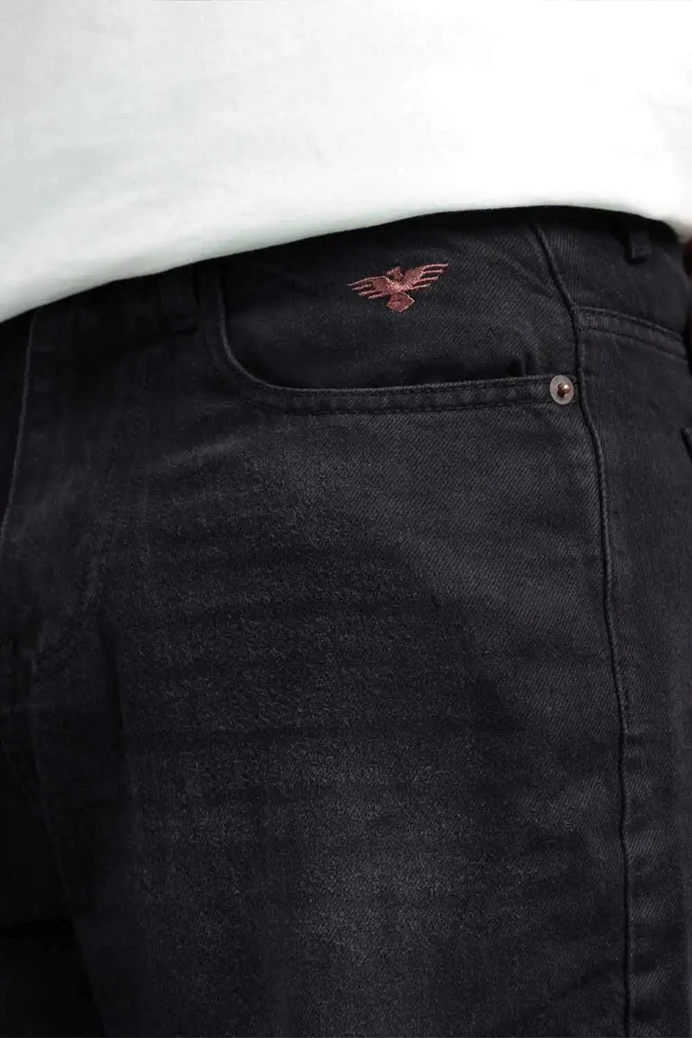 Black pants with an embroidered eagle logo