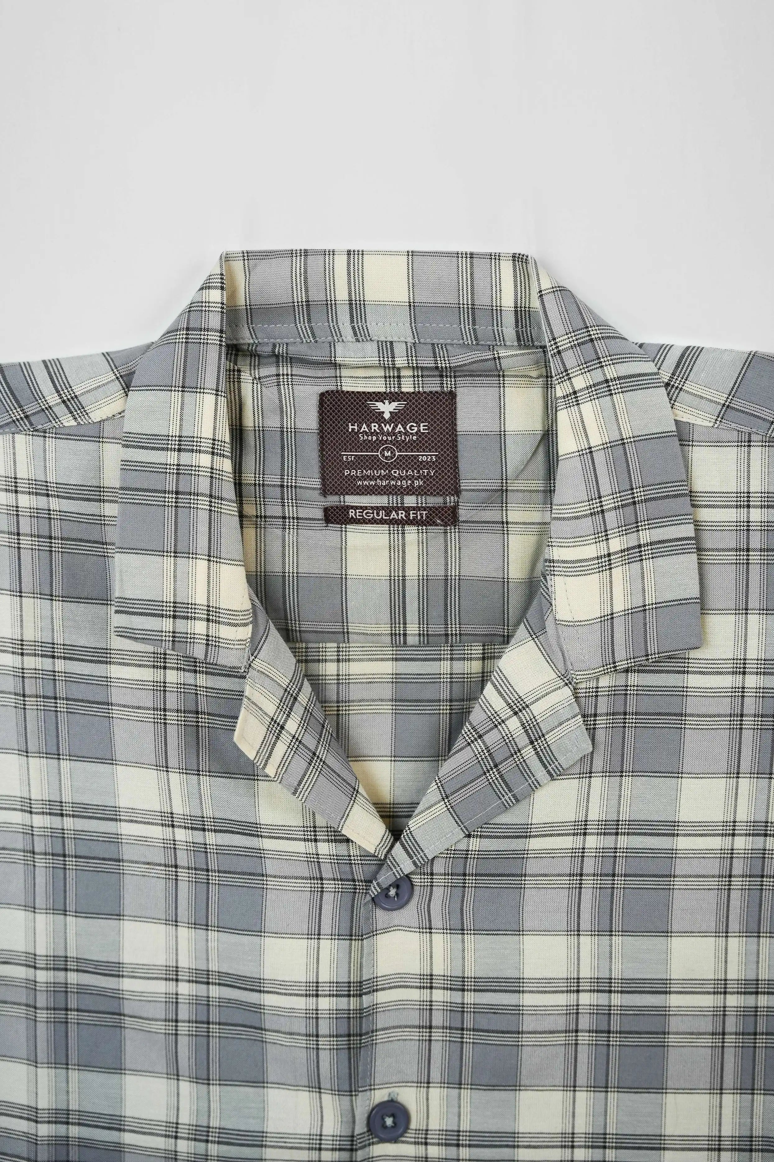 Plaid grey casual shirt with a Harwage brand label 