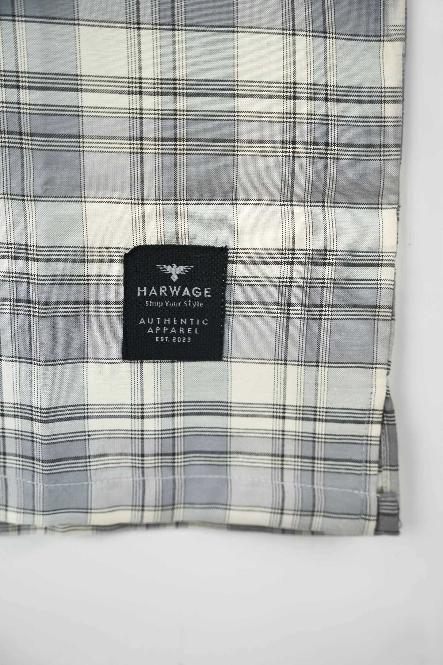 Plaid shirt with a Harwage brand label 