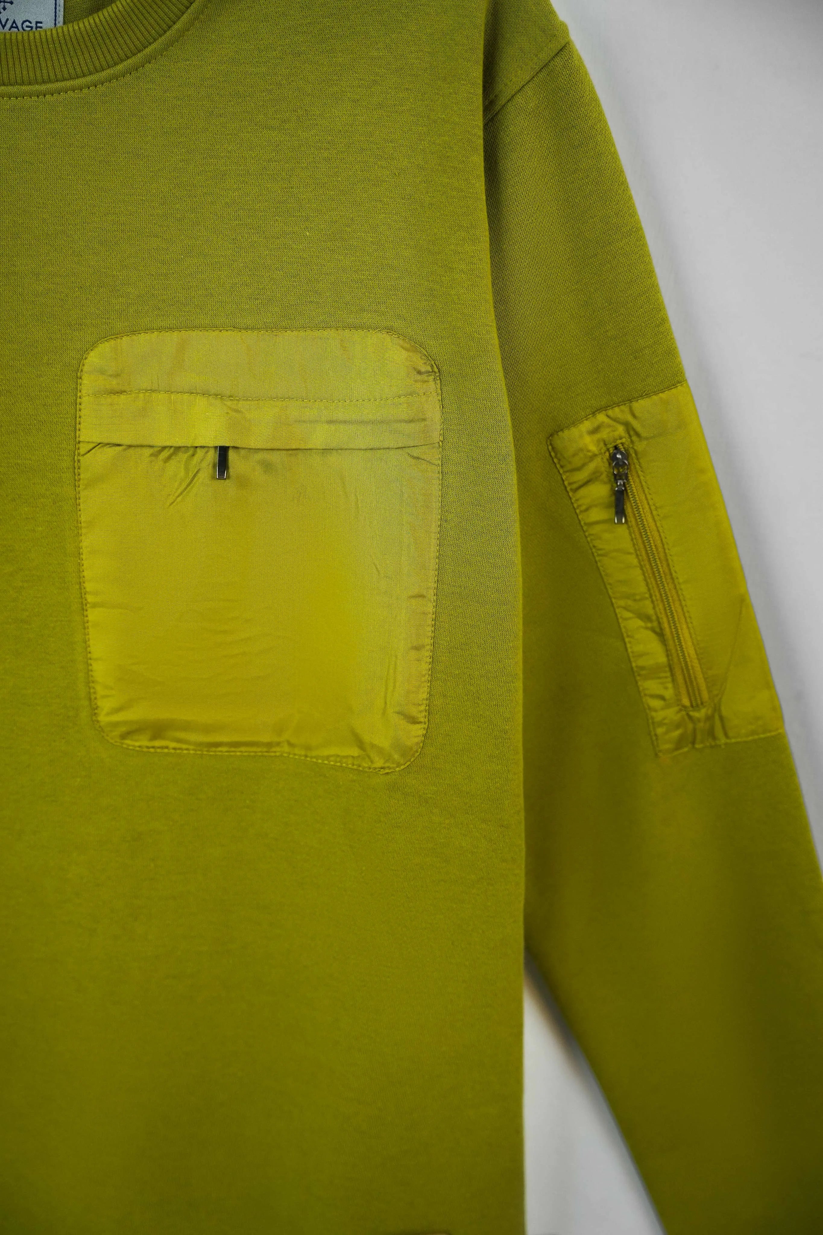 Pocket close-up highlighting stitching on Olive Green Sweatshirt