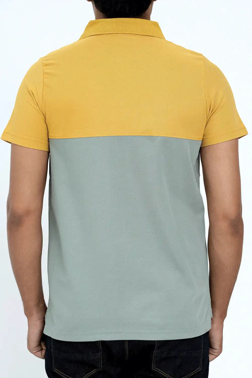 Two-tone yellow and gray polo shirt worn by a person
