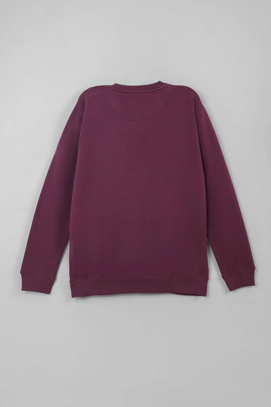 Rear facing flat layout of a maroon sweatshirt on a light background