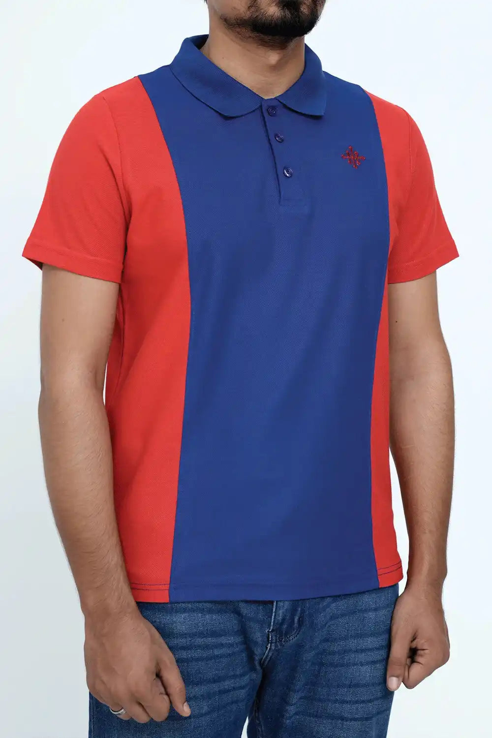 Person wearing a red and blue polo shirt on a white background