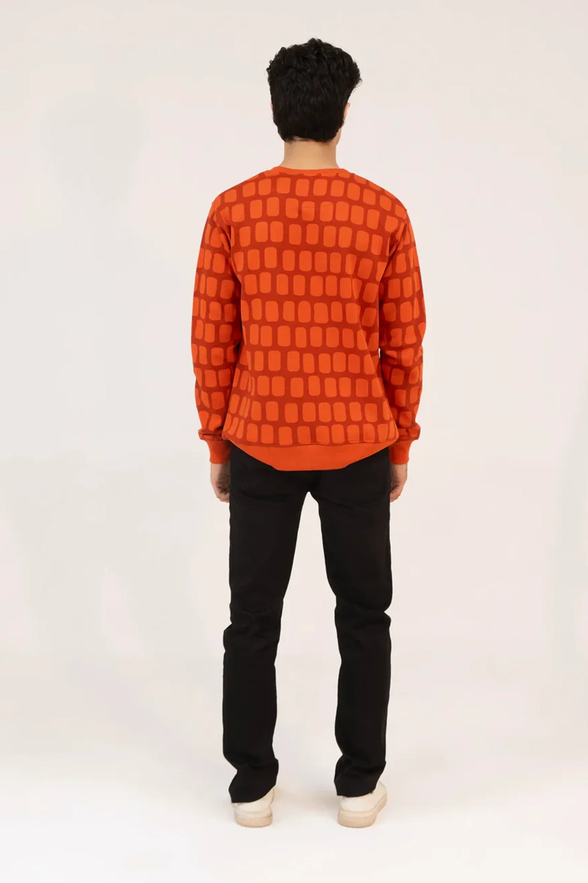 Men wearing a Red Geometric Sweatshirt shown from back with casual fit