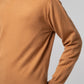 Side angle highlighting fit of crew neck sweater mustard