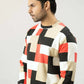 Side angle view highlighting the fit of the checkered sweatshirt