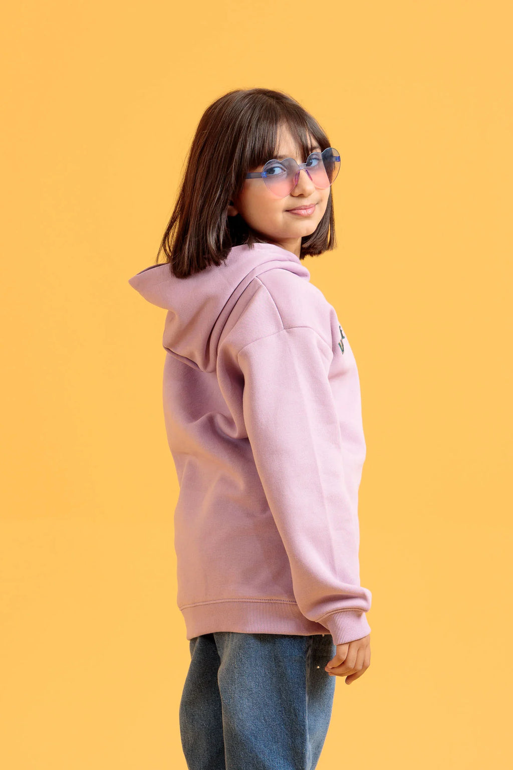 Side view of a junior girl's lavender herb hoodie