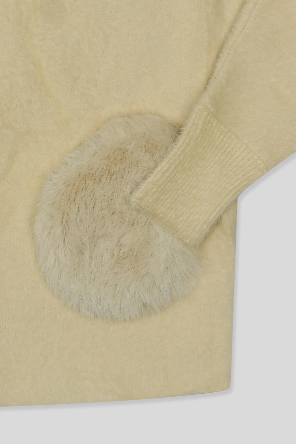 Skin wool cardigan sleeve with a soft fur pom-pom detail