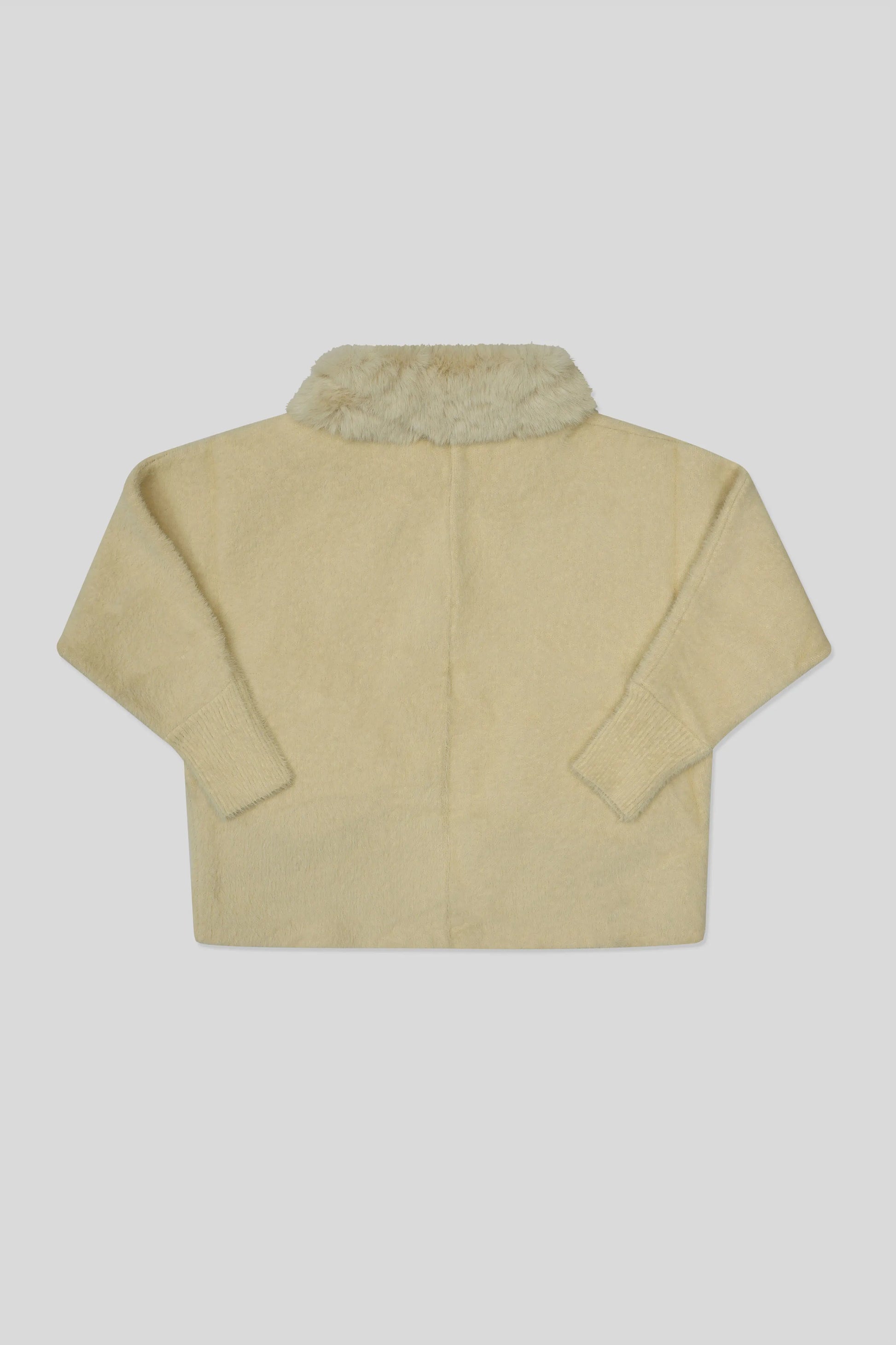 Skin wool cardigan with fur collar on a light gray background