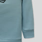 Sleeve and hem detail of aqua blue boys sweatshirt