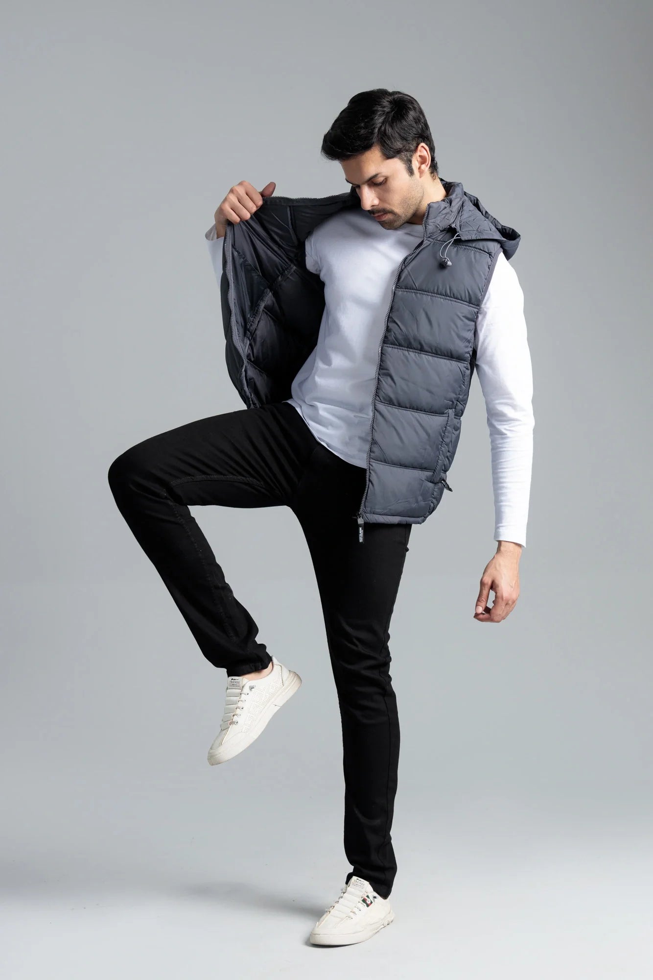 Man wearing Sleeveless Parachute Jacket Grey in motion
