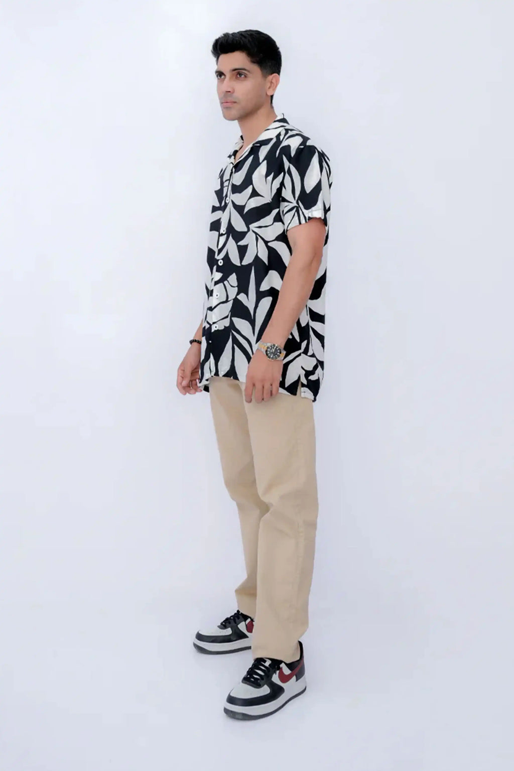 A stylish black and white patterned resort collar shirt