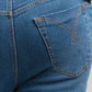 Close-up of blue jeans with a focus on the pocket area