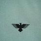 Teal shirt with a black eagle logo 