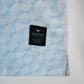 Textured light blue cotton shirt fabric with Harwage label