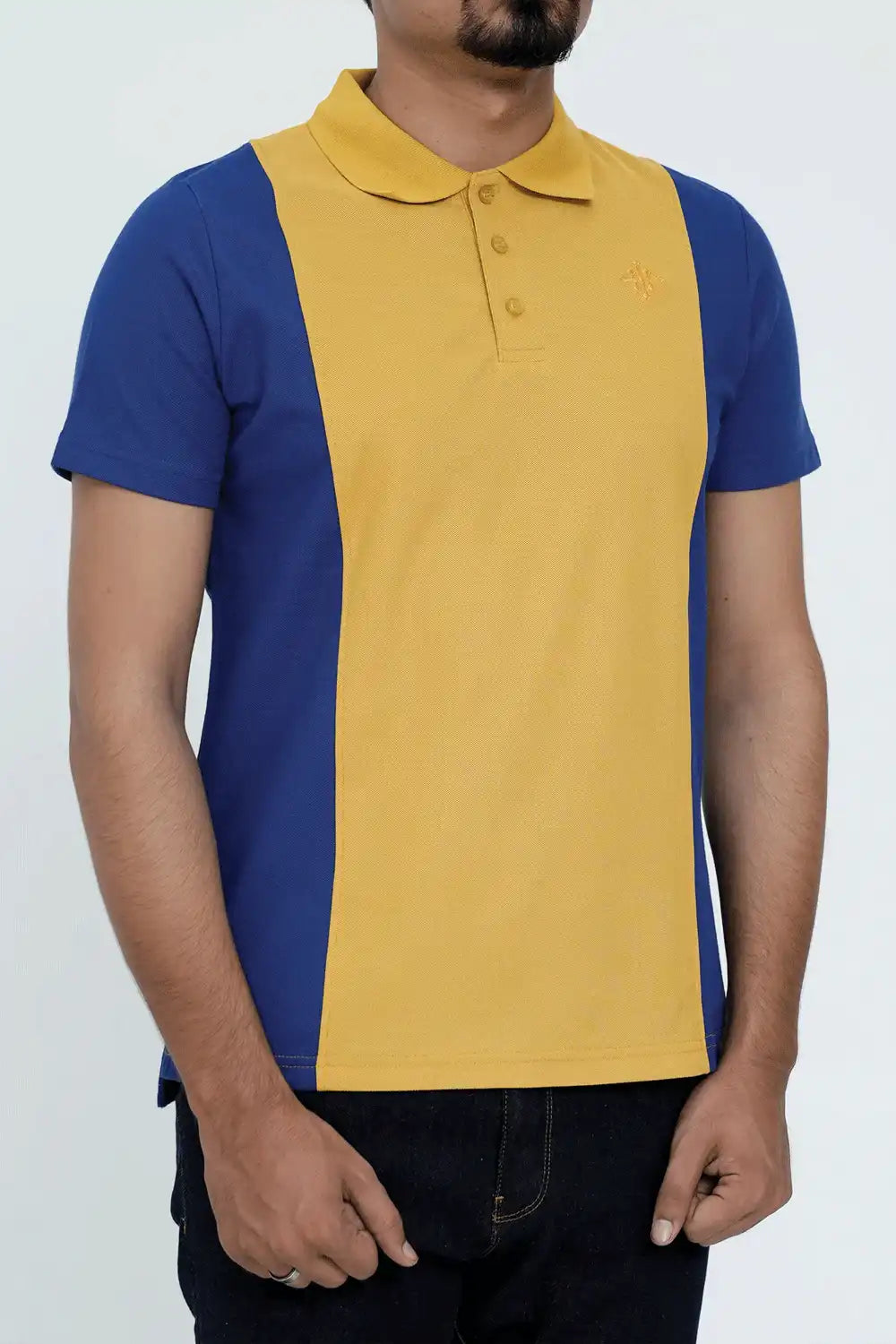 Person wearing a two-tone blue and yellow polo shirt