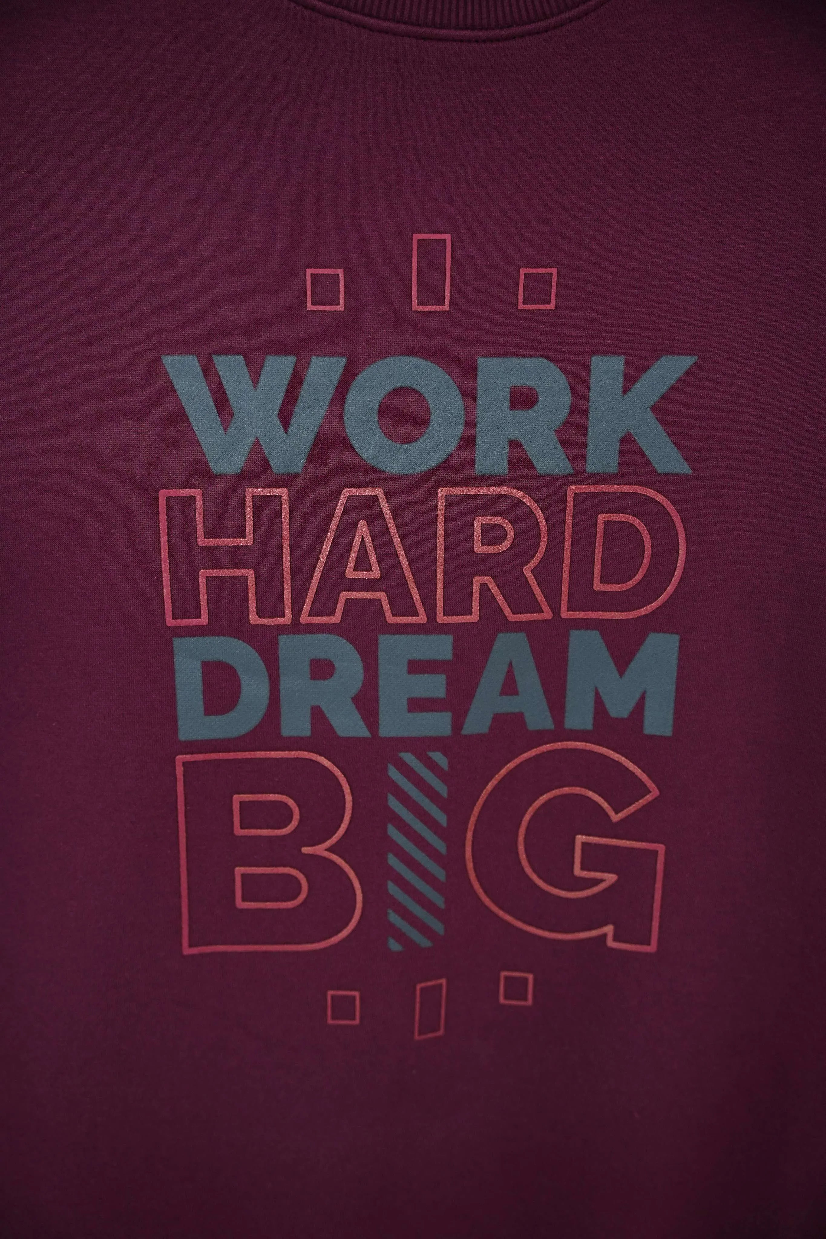 Typography close of Work Hard Dream Big print