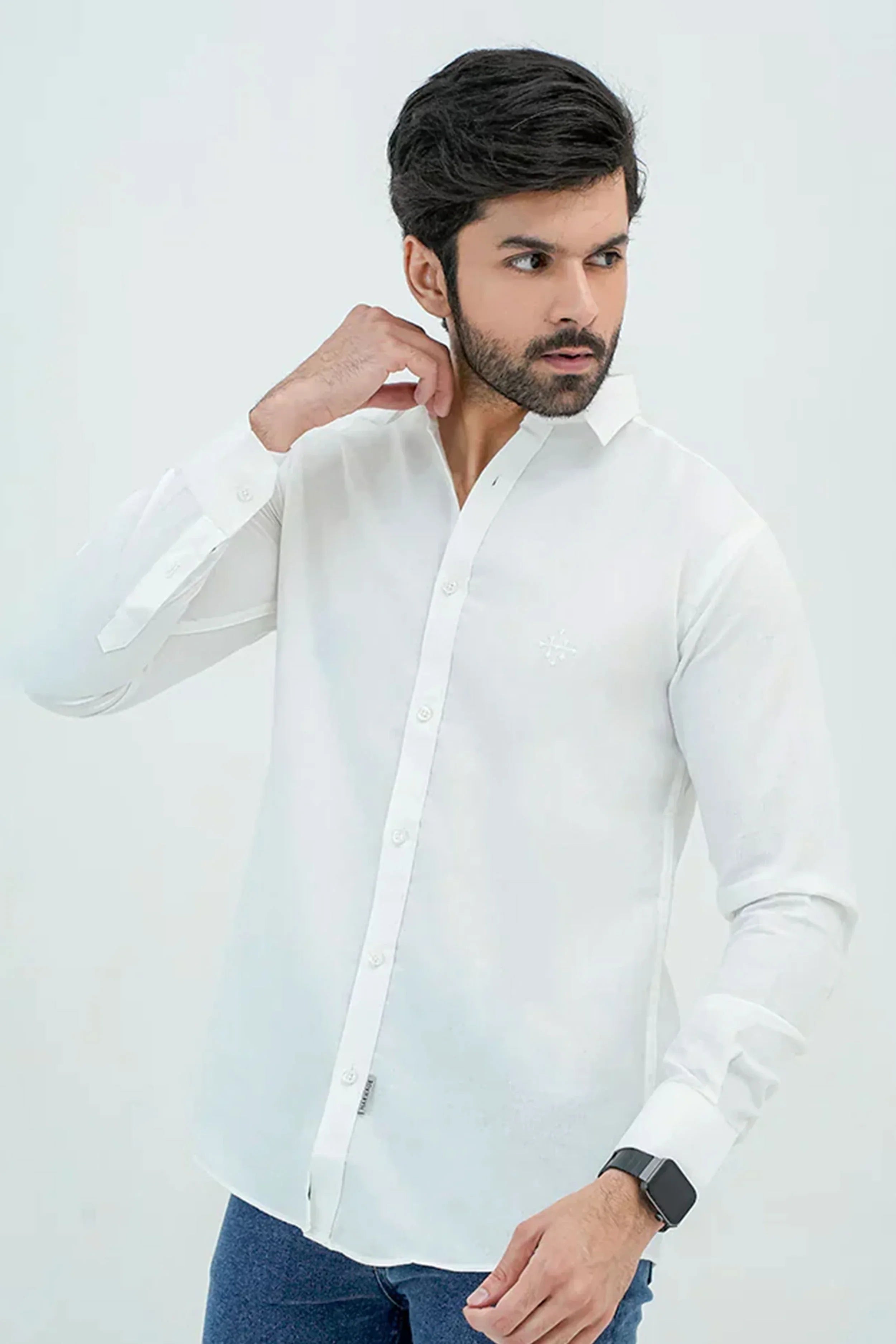 White Oxford Shirt worn by male model adjusting collar front view