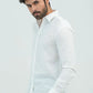 White Oxford Shirt worn by male model in side profile pose