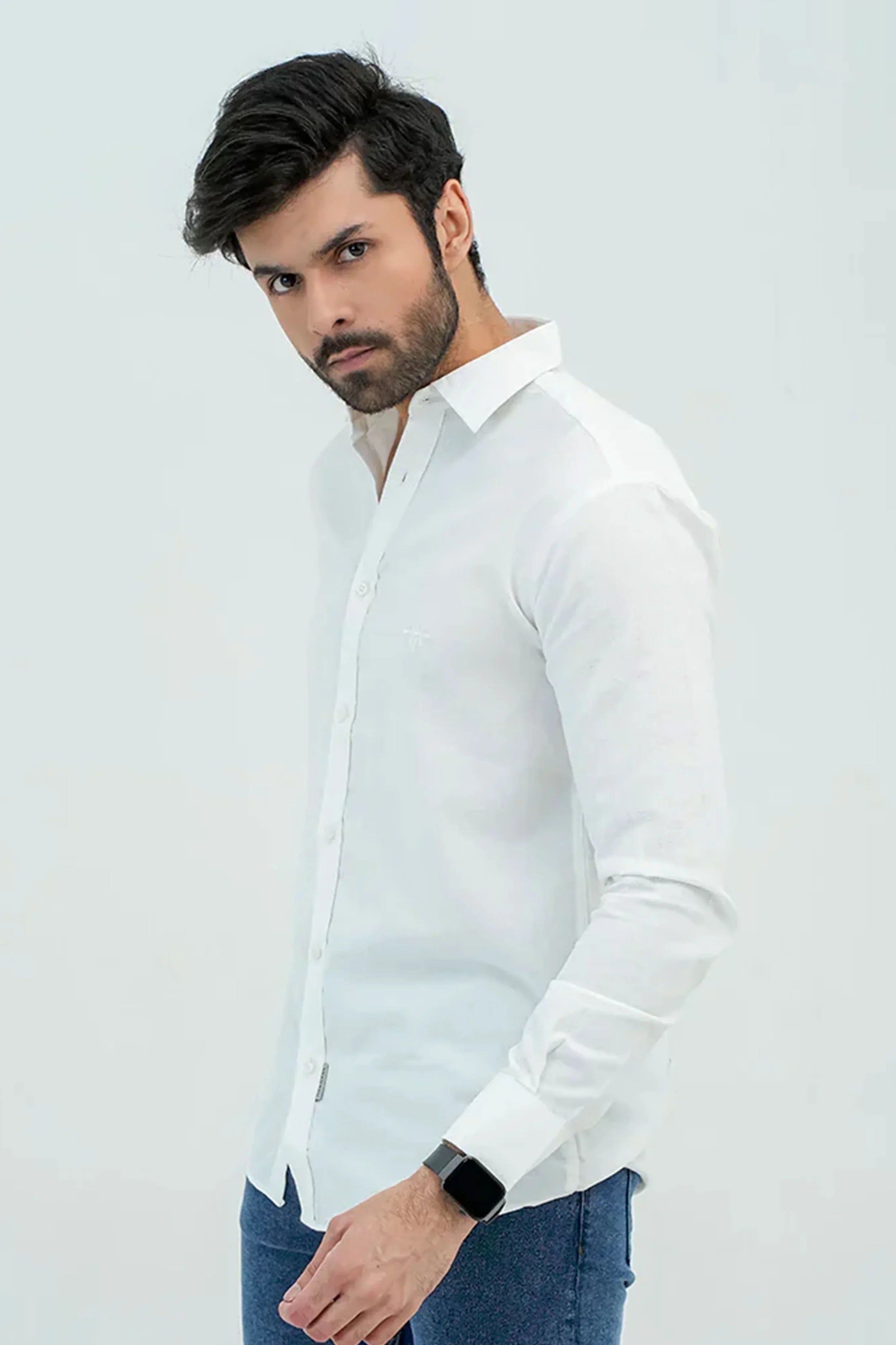 White Oxford Shirt worn by male model in side profile pose
