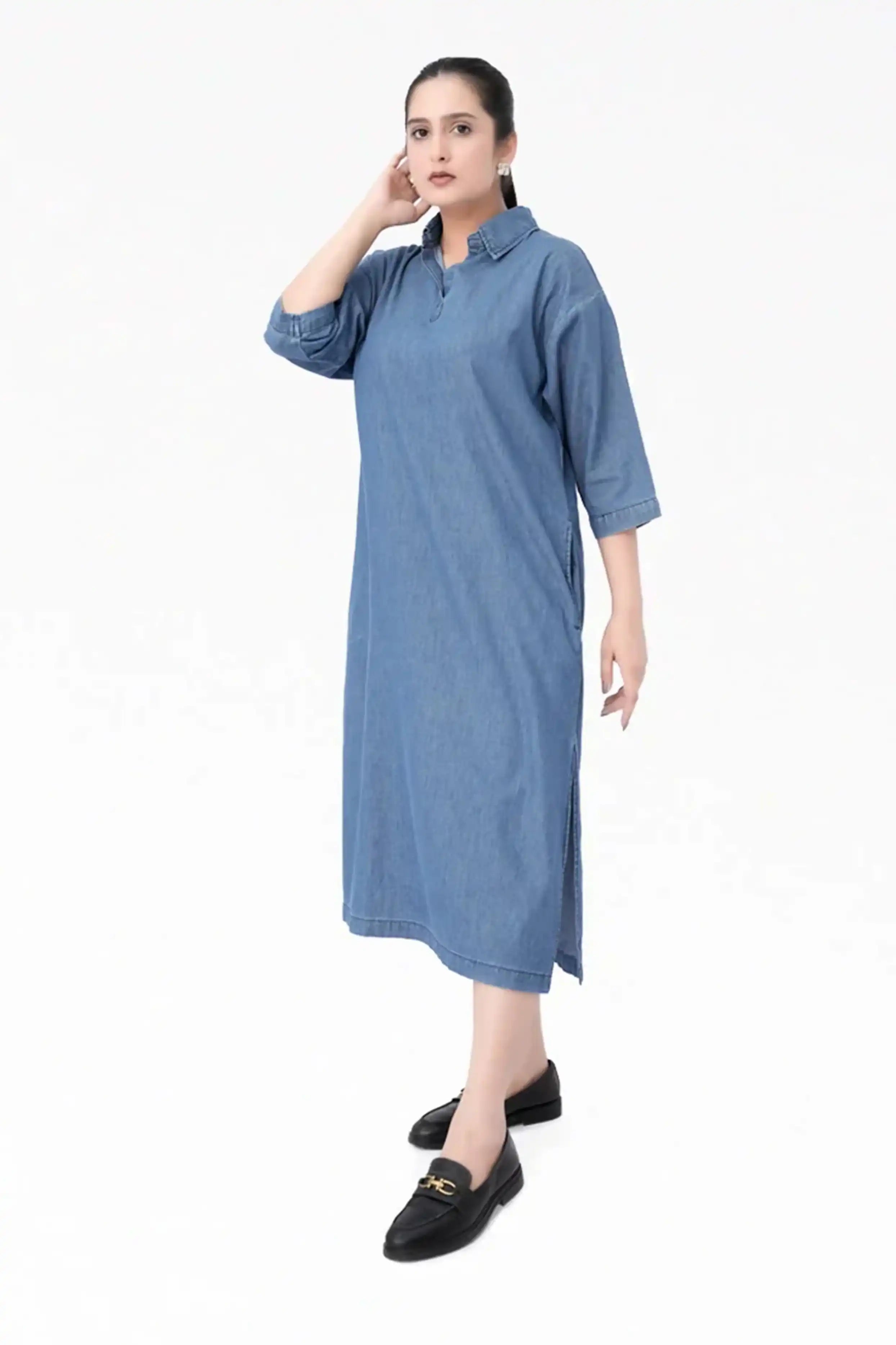 Woman wearing a blue dress on a white background